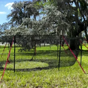 9:16 vertical medium-close view of The P.I.G. Hog Trap™ at ground level, showcasing a professional feral hog trapping system designed for complete sounder removal and effective feral hog control.