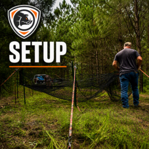 The P.I.G. Hog Trap™ setup category image featuring trap installation in a wooded environment with SETUP text, TPHT shield logo, and deployment netting.